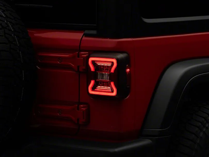 Raxiom Tail Lights Jeep Wrangler JL (18-23) [w/ Factory Halogen Lights] Black Housing / Smoked or Red Lens
