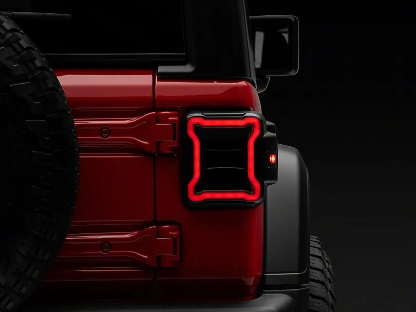 Raxiom Tail Lights Jeep Wrangler JL (18-23) [w/ Factory Halogen Lights] Black Housing / Smoked or Red Lens