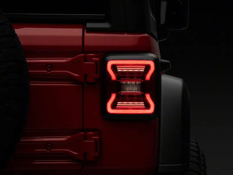 Raxiom Tail Lights Jeep Wrangler JL (18-23) [w/ Factory Halogen Lights] Black Housing / Smoked or Red Lens